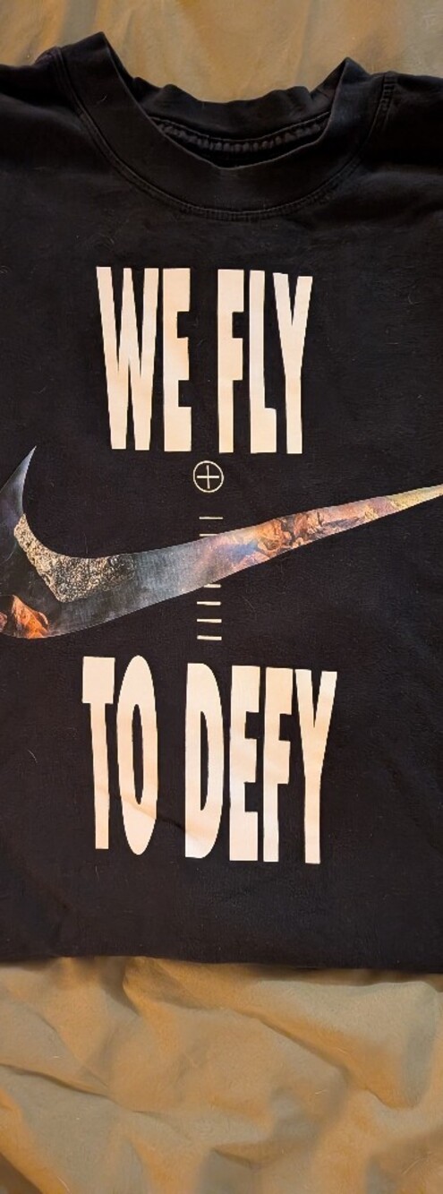 Nike Black Graphic 'We Fly To Defy' Long Sleeve Tee